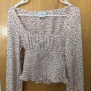 Princess poly blouse. Colors black white and red